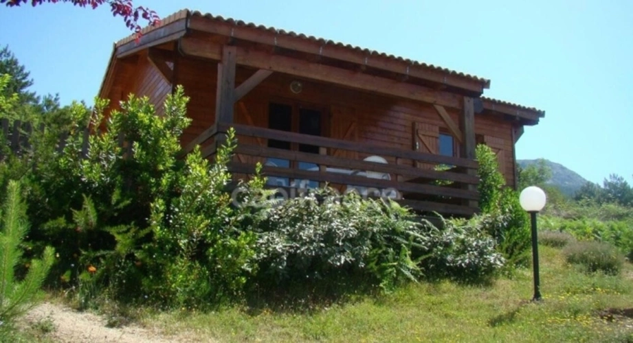 Photos 4 - Touristique - Dpt Corse (20), à vendre EVISA, ensemble de six chalets en bois avec terrasse sur terrain avec piscine et parking