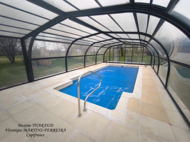 Photos 2 - Prestige - À Vendre : Charmante Maison 7 pièces avec Piscine Chauffée DUN-LE-POELIER (36)