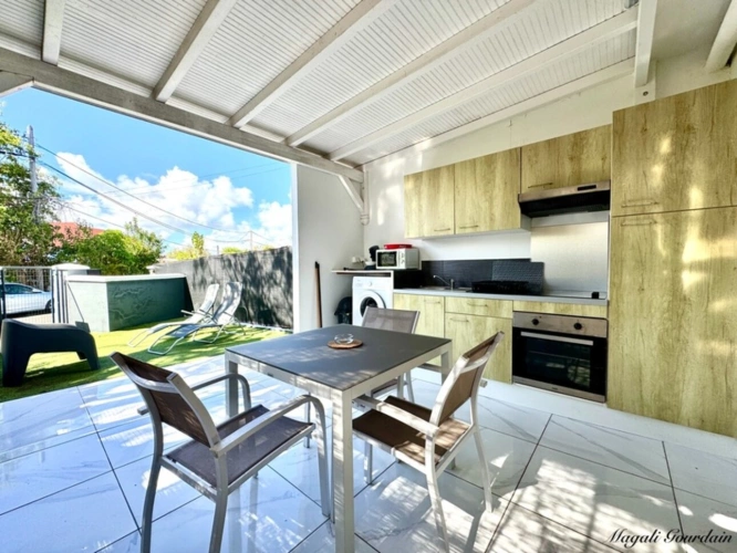 Photos 21 - Prestige - EN EXCLUSIVITE - A VENDRE - PROPRIETE D'EXCEPTION AVEC VUE MER ET POTENTIEL LOCATIF REMARQUABLE - SAINTE ANNE
