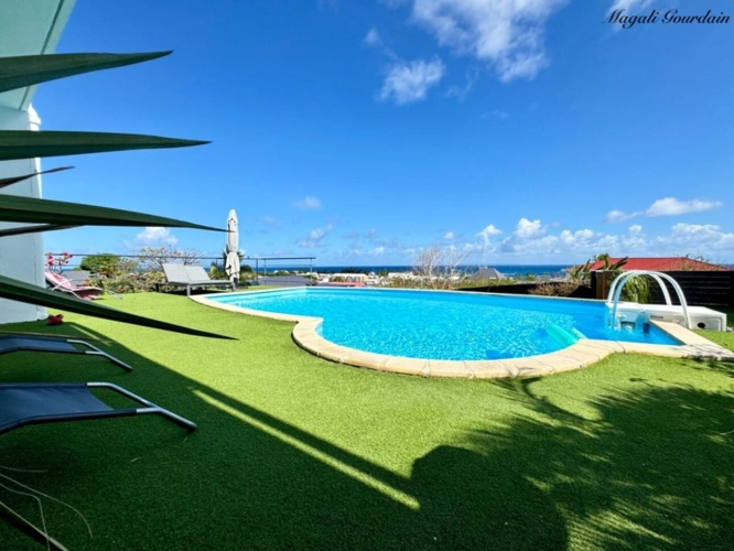 Photos 29 - Prestige - EN EXCLUSIVITE - A VENDRE - PROPRIETE D'EXCEPTION AVEC VUE MER ET POTENTIEL LOCATIF REMARQUABLE - SAINTE ANNE
