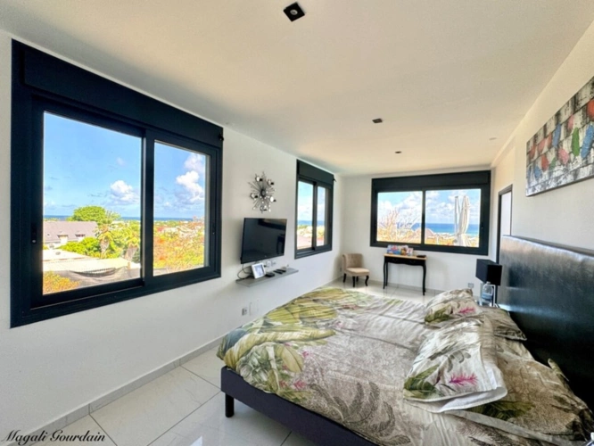 Photos 7 - Prestige - EN EXCLUSIVITE - A VENDRE - PROPRIETE D'EXCEPTION AVEC VUE MER ET POTENTIEL LOCATIF REMARQUABLE - SAINTE ANNE