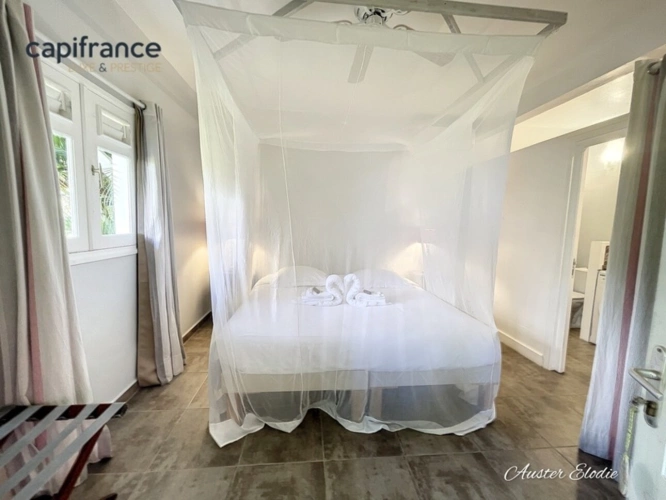 Photos 12 - Touristique - Propriété de 3 villas T3 avec piscine un T3 et deux T1 vue imprenable montagne et Mer des Caraïbes