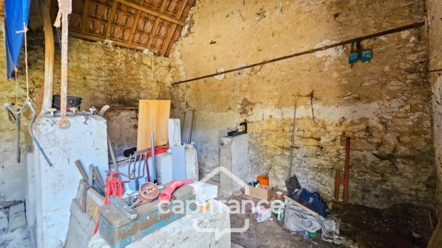 Photos 5 - Touristique - Grange en pierre à rénover-68 m2-Garage indépendant-Abris à bois-Terrain non attenant d'environ 950 m2