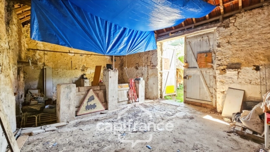 Photos 2 - Touristique - Grange en pierre à rénover-68 m2-Garage indépendant-Abris à bois-Terrain non attenant d'environ 950 m2