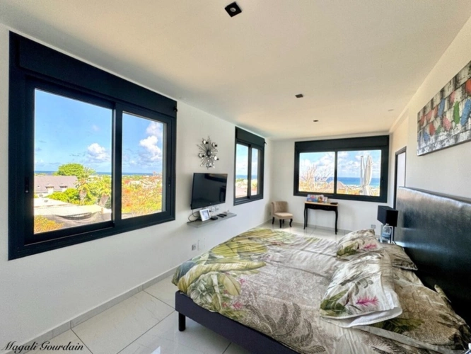 Photos 6 - Prestige - EN EXCLUSIVITE - A VENDRE - PROPRIETE D'EXCEPTION AVEC VUE MER IMPRENABLE & STUDIO ATTENANT - SAINTE ANNE
