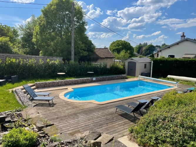Photos 3 - Touristique - Vaste ferme avec 5 grands appartements et une piscine extérieure chauffée