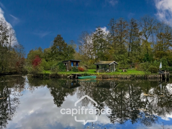 Photos 1 - Foncière -  Terrain de loisirs avec étang – 11 110 m² – Maigné