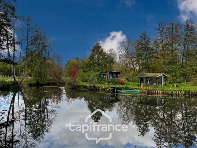 Photos 4 - Foncière -  Terrain de loisirs avec étang – 11 110 m² – Maigné