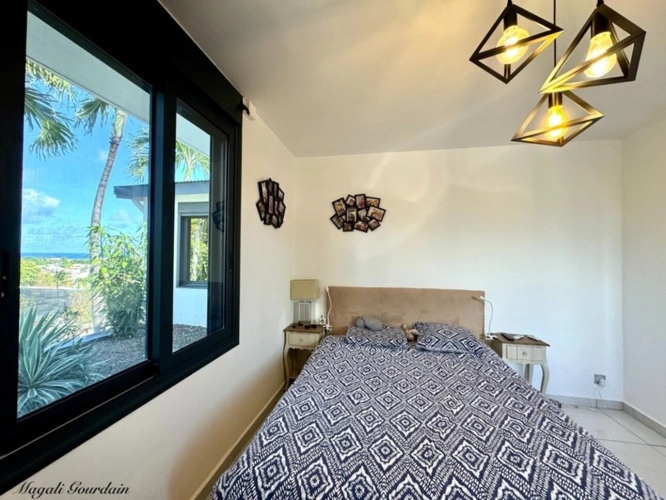 Photos 12 - Prestige - EN EXCLUSIVITE - A VENDRE - PROPRIETE D'EXCEPTION AVEC VUE MER IMPRENABLE & STUDIO ATTENANT - SAINTE ANNE