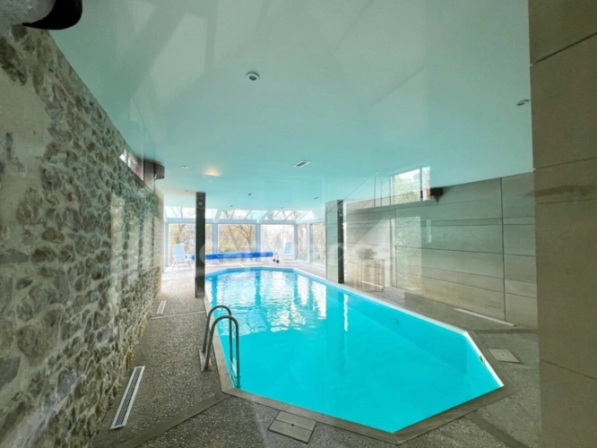 Photos 8 - Prestige - À VENDRE - ST LÉONARD - PROPRIÉTÉ DE CARACTÈRE EN PIERRES - 4,75 HECTARES - 7 APPARTEMENTS - PISCINE COUVERTE - LOCAL TECHNIQUE