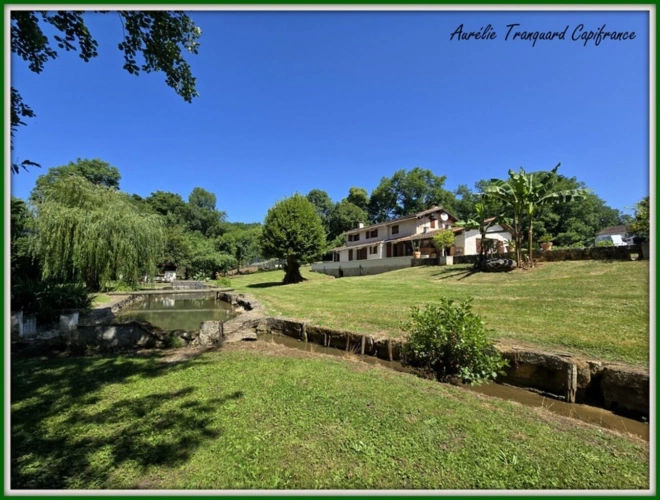Photos 3 - Rurale - Propriété d'exception à vendre 7 pièces BRIZAMBOURG (17) avec vie de plain-pied, terrain de tennis, piscine- TERRAIN DE + 14300m² AVEC ETANG