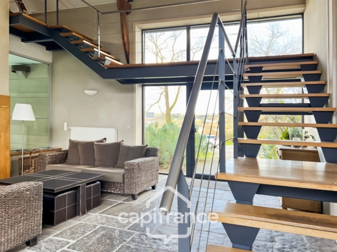 Photos 24 - Touristique - ST-LÉONARD - ENSEMBLE IMMOBILIER - APPART'HOTELS - 8 LOGEMENTS - HABITATION PRINCIPALE 280 M2 - 9 PIÈCES - 5 ha 50 - 13000 M2 CONSTRUCTIBLE - PISCINE INTÉRIEURE