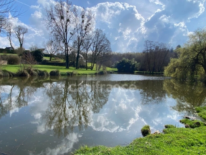 Photos 1 - Prestige - Un écrin de nature rare, entre étang et ruisseau, en plein cœur d’Elven et sans vis à vis