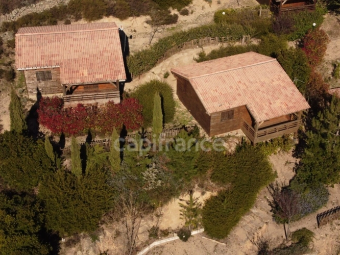 Photos 1 - Touristique - Dpt Corse (20), à vendre EVISA, propriété avec six chalets en bois, terrasse vue panoramique, piscine, parking
