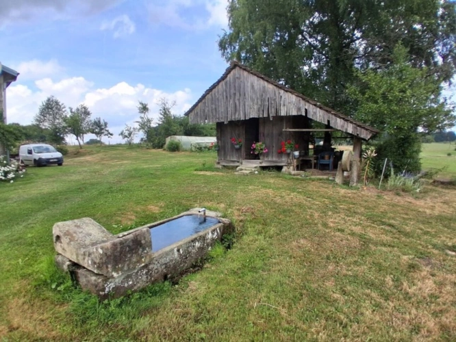 Photos 13 - Touristique - PLOMBIERES LES BAINS (88) Coprs de ferme de 300m² + Gîte de 120m²  activité de chambres d'hôtes terrain 2 hectares