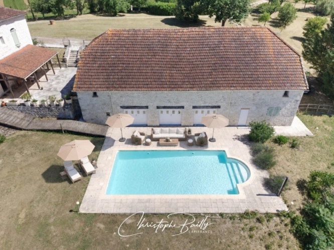 Photos 2 - Touristique - Lauzerte, propriété en pierre avec maison d’amis, piscine et vue sur 9 306 m², proche Montauban