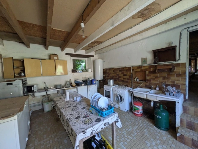 Photos 20 - Rurale - LOCMALO CORPS DE FERME COMPOSE 2 GRANDES LONGÈRES EN PIERRE DE 105m² ENVIRON ET 130 M² ENVIRON DEUX HANGARS DE 530M³ ET 3500M² ET DÉPENDANCES PARCELLE DE 9000m² ENVIRON