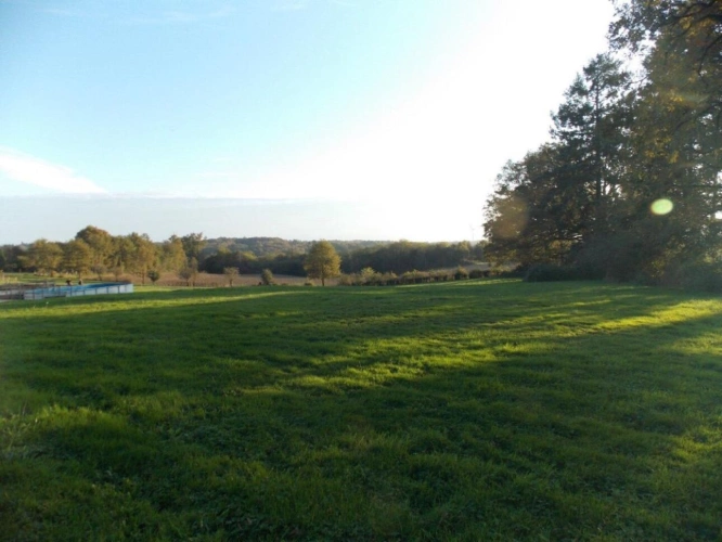 Photos 6 - Rurale - Charmante propriété individuelle en pierre rénovée avec grange, hangar, grand jardin, piscine et magnifique vue dégagée sur la campagne