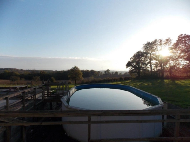 Photos 9 - Rurale - Charmante propriété individuelle en pierre rénovée avec grange, hangar, grand jardin, piscine et magnifique vue dégagée sur la campagne