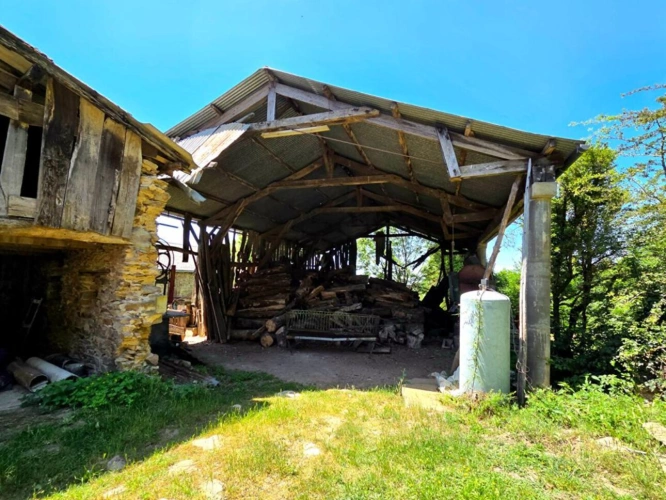 Photos 16 - Rurale - Havre de paix composé par un corps de ferme en pierres sur près de 1ha