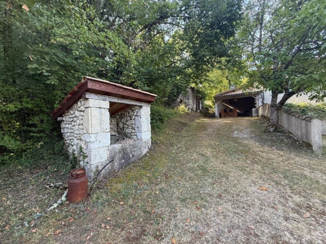 Photos 3 - Rurale - Dans la campagne de Lauzerte - Belle maison en pierre composée de deux logements, idéale pour investissement locatif ou projet mixte