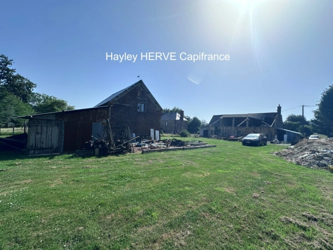 Photos 3 - Rurale - Ensemble de bâtiments avec terrain clos de 3 600 m² – Idéal artisan CHAULIEU (50)