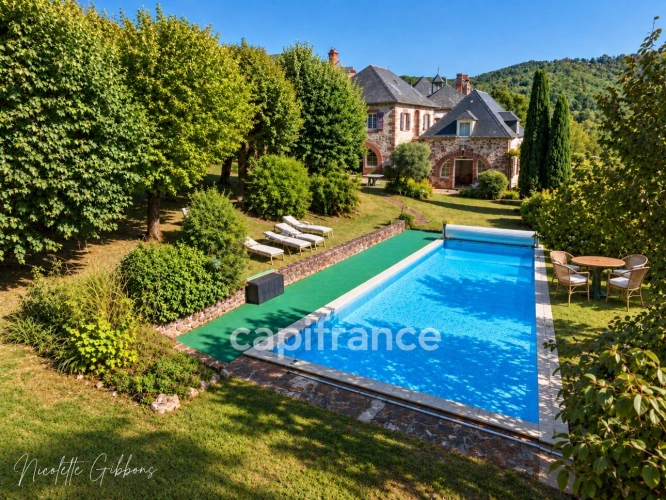 Photos 1 - Prestige - EXCLUSIVITÉ – BELLE DEMEURE DE CARACTÈRE AVEC GRAND PARC ET PISCINE AU CŒUR DE MEYSSAC