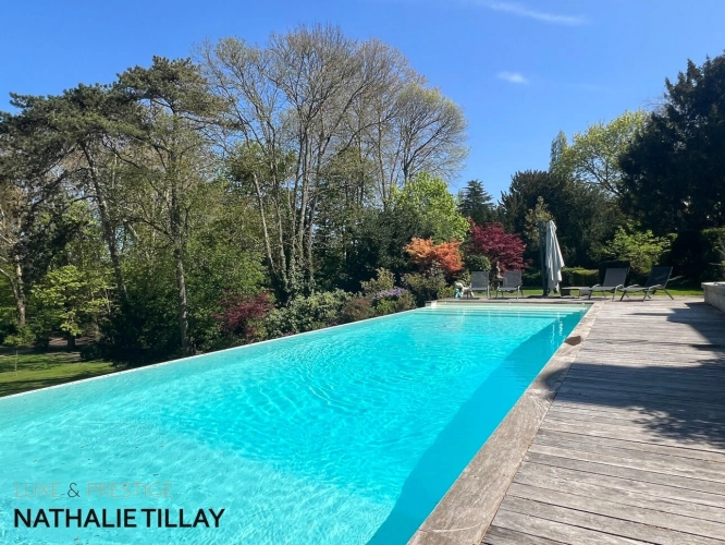 Photos 18 - Prestige - Propriété, OLIVET avendre, bord du Loiret, parc, piscine a debordement, garage a bateau