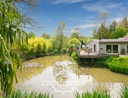 Vignette - Foncière - Proche SAINT-QUENTIN (02) : terrain de loisir 3200 m² au bord de l’Oise avec Chalet et potentiel locatif