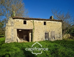 Vignette - Rural - In Charente Maritime, in the town of LANDES (17380), a barn to renovate on 2313m² of wooded land.
