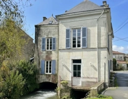 Vignette - Rurale - Ancien moulin à eau, une opportunité d'investissement, tout-à-l'égout avec potentiel de construction de plusieurs logements