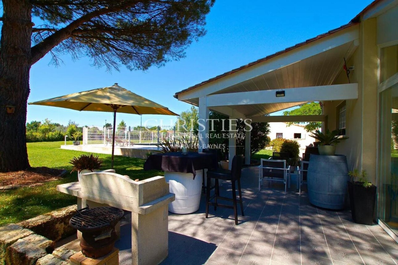 Photos 19 - Prestige - Charmante maison en moellon de 200 m² avec double garage, cuisine d’été avec avancée de toit et un grand parc clôturé de 5000 m²